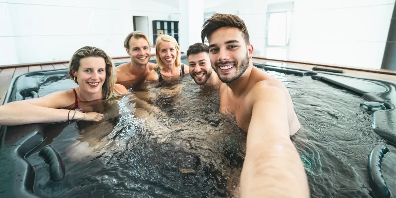 satisfied guests in a jacuzzi