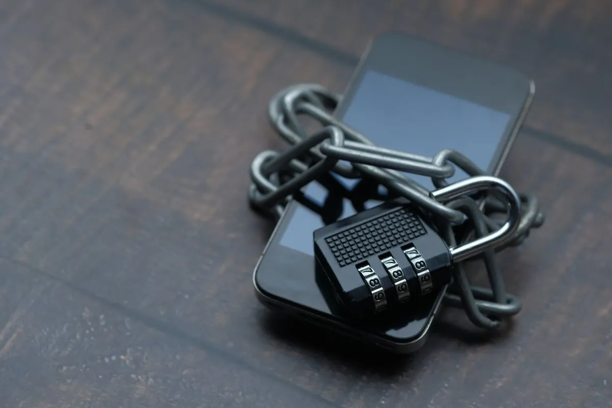 Smartphone wrapped in a chain symbolizing personal data privacy