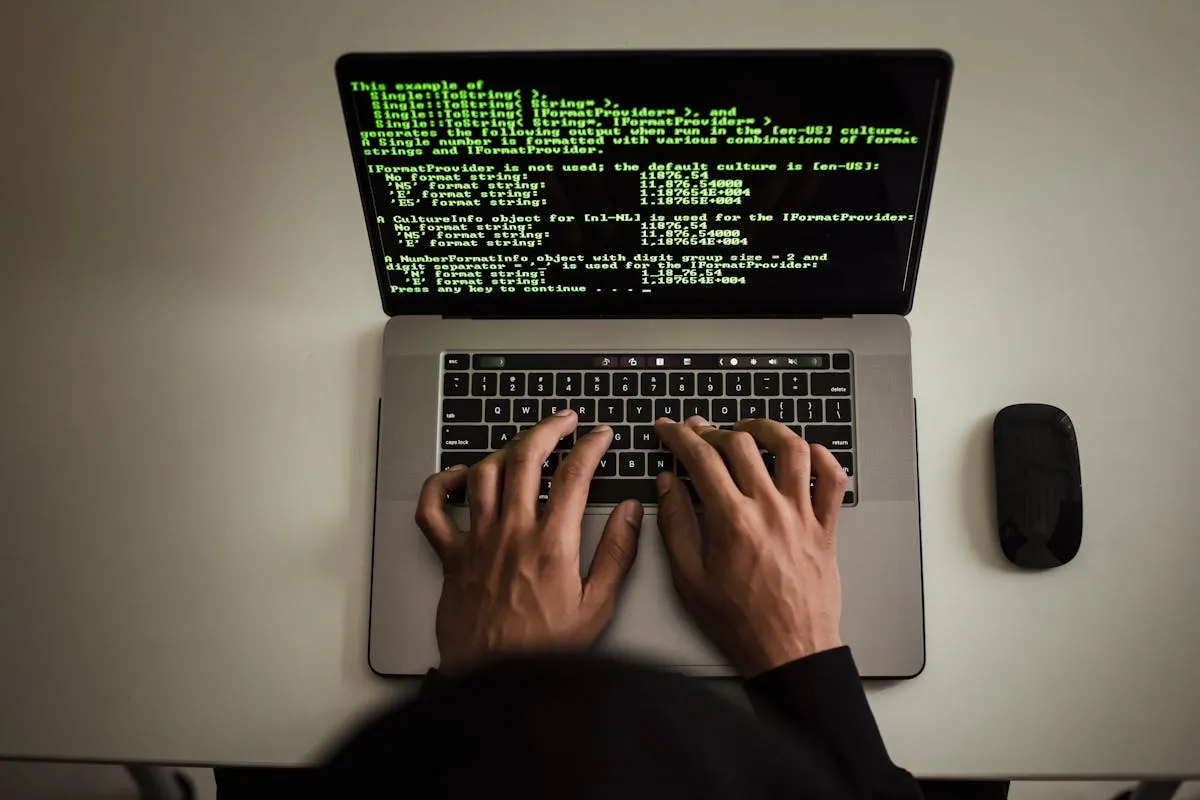 Host reviewing vacation rental property management software on laptop